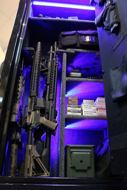 60 inch tall by 28 inch wide Old Glory gun safe unlocked loaded in gloss black with blue LED lights