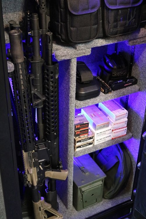 60 inch tall by 28 inch wide Old Glory gun safe unlocked loaded with blue LED lights
