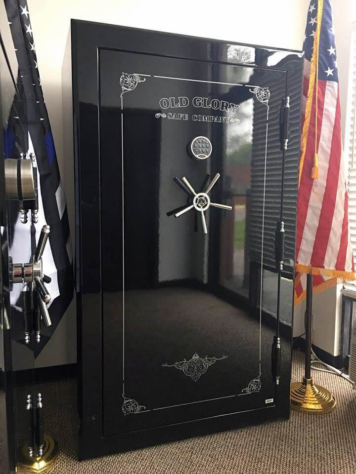 72 inch tall by 42 inch wide Old Glory LE gun safe locked in gloss black in show room