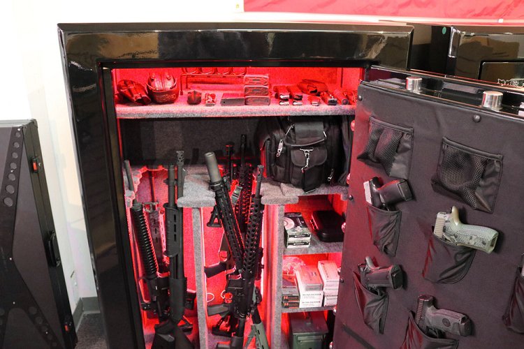 60 inch tall by 39 inch wide Old Glory Super Duty gun safe unlocked in gloss black with door storage, and red LED lights