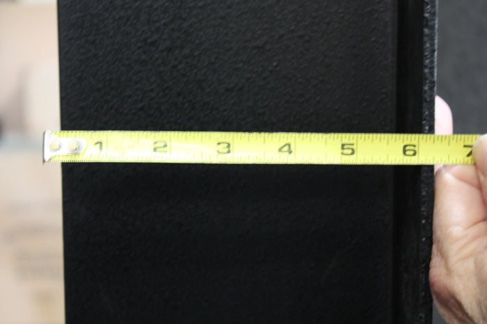 Tape measuring the door frame at 6 inches Deep