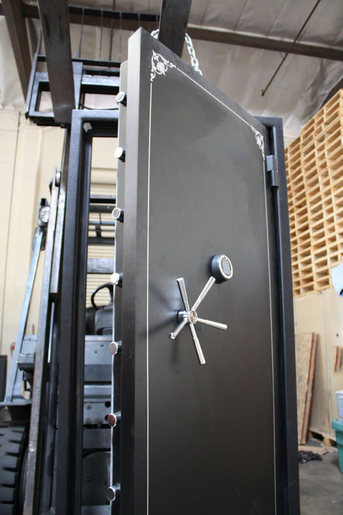 80 inch tall by 35 inch wide Old Glory vault door unlocked in textured black