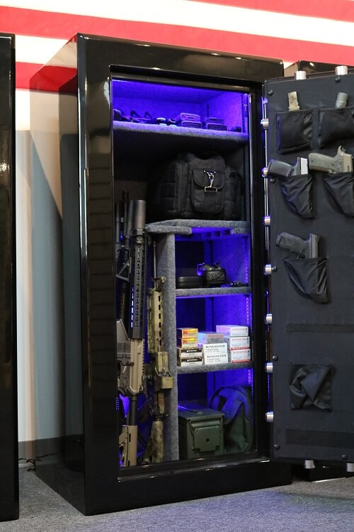 
                  
                    60 inch tall by 30 inch wide Old Glory Battle Ready gun safe unlocked loaded in gloss black with blue LED lighting
                  
                