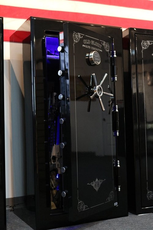 
                  
                    60 inch tall by 30 inch wide Old Glory Battle Ready gun safe unlocked in gloss black with LED lights
                  
                