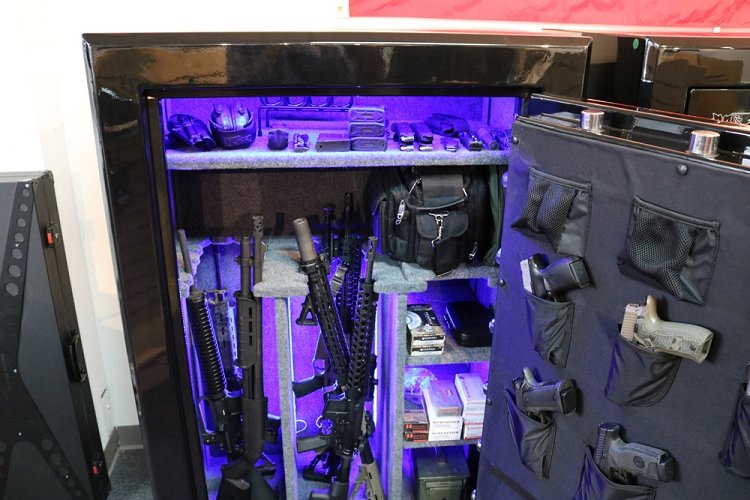 60 inch tall by 39 inch wide Old Glory Battle Ready gun safe unlocked in gloss black loaded with LED lighting and door storage